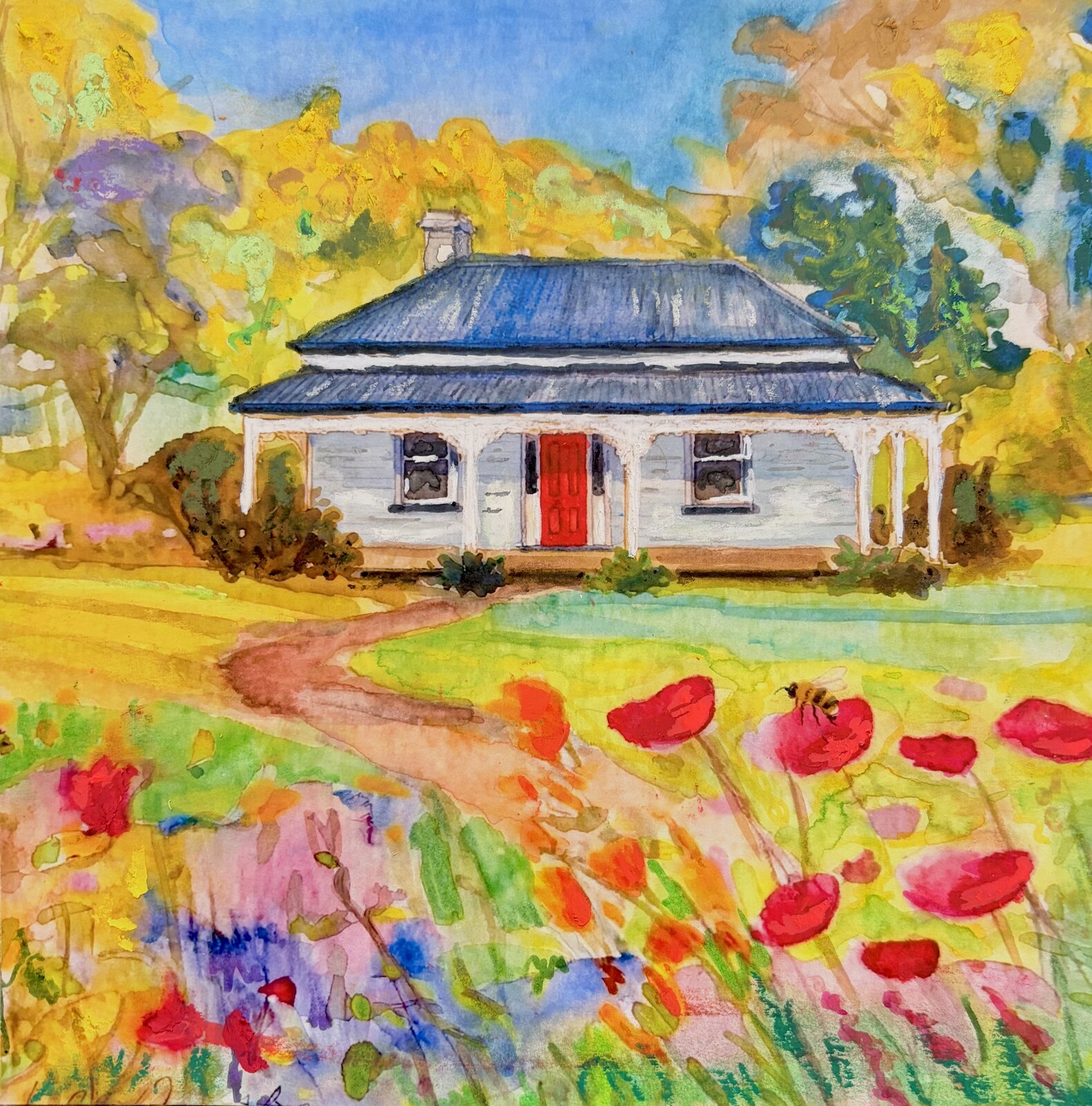 Blue-roofed cottage with red door, autumn trees and poppies